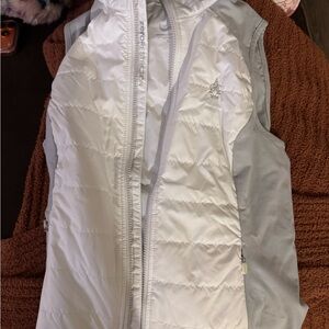 White and Gray women’s vest from aronimink golf club pro shop
